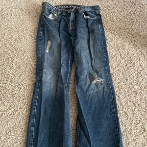Men’s dark blue low rise bootcut jeans